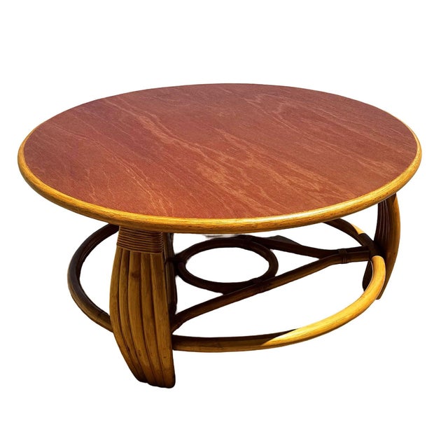This beautifully restored Mid-century Five-strand rattan coffee table with mahogany top. The table features a circular...