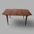 A beautifully proportioned mid-century teak extending dining table by A.H. McIntosh of Kirkcaldy, featuring an integrated...