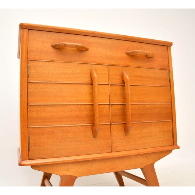 A very stylish and quite rare 1950’s vintage bureau cabinet by e gomme. This was made in england by e gomme, which a short...