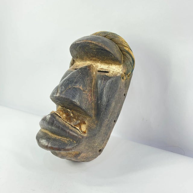 Dan masks, originating from the Dan people of Liberia, CÃ´te d'Ivoire, and Guinea, are recognized for their elongated...