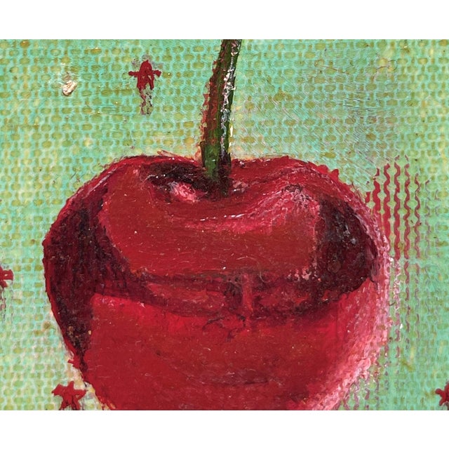 Contemporary Cherry Jubilee by Tammi Otis | Oil on Canvas Painting of a red cherry on a green background For Sale - Image 3 of 4
