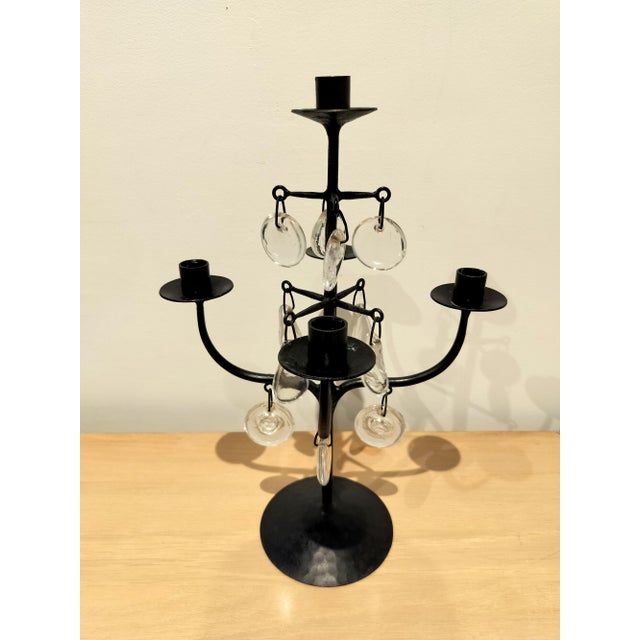 Mid Century candelabra by renowned Swedish designer, Erik Hogland. Iconic design of hand-wrought iron and hand made glass...