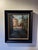 Golden Triangle Sunset captures a serene urban alley bathed in warm, golden light as the sun sets. The interplay of...