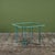 A small patio dining or card table in patinated bronze, designed by Walter Lamb and produced by Brown Jordan. The table...
