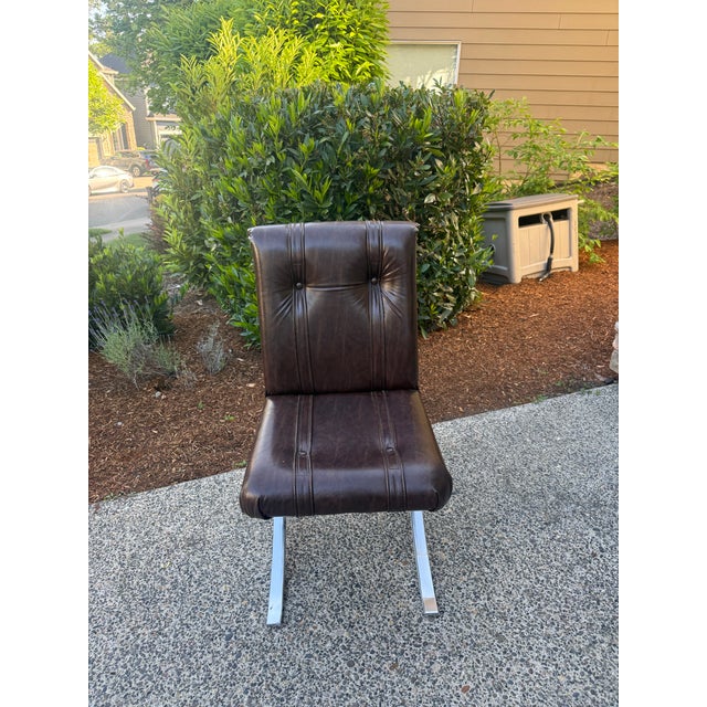 Vintage lounge chair by Cal-Style Furniture Mfg. Co. of Compton, California, circa 1970s. Features a sleek polished chrome...