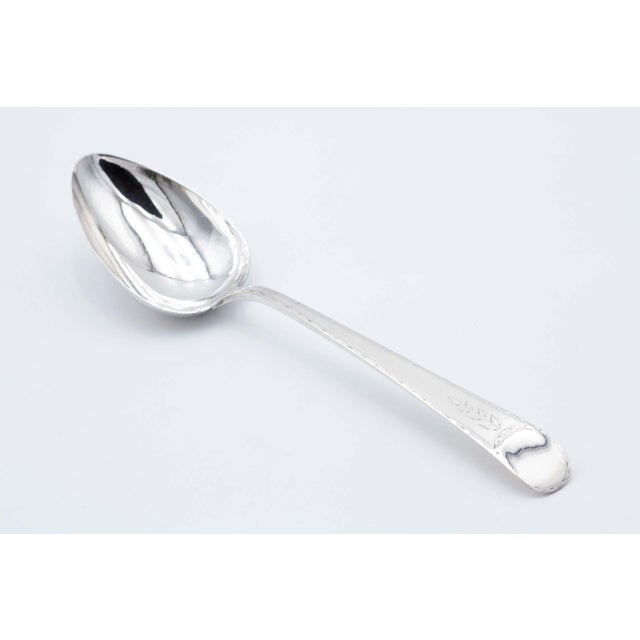 Silver Rice Spoon with Handle Engraving, in Very Good conditions. Designed before 1890 This piece has an attribution mark,...
