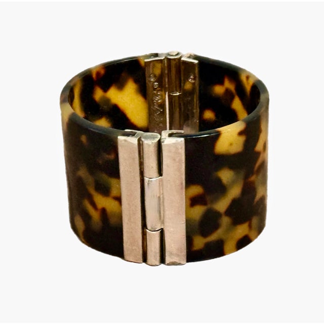 1990s Ralph Lauren faux tortoise cuff with silverplate clasp and hardware. Not adjustable, best fits a small wrist.