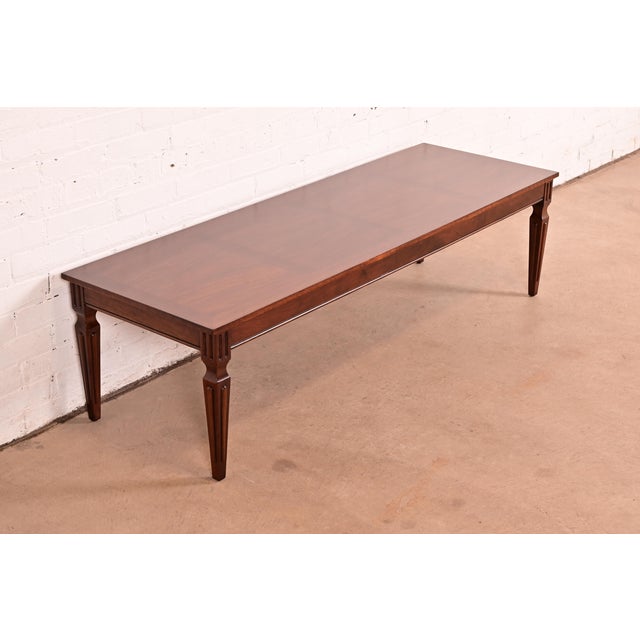 A gorgeous French Regency Louis XVI style coffee table or cocktail table. By Baker Furniture USA, Circa 1960s Beautiful...
