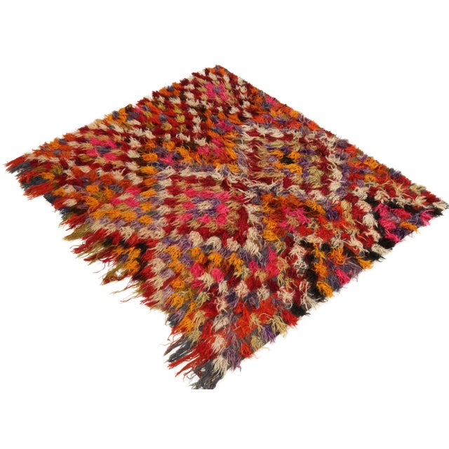 From Rug & Kilim’s Vintage selections, a hand-knotted mid-century Tulu rug carrying a luscious high pile. Originating from...