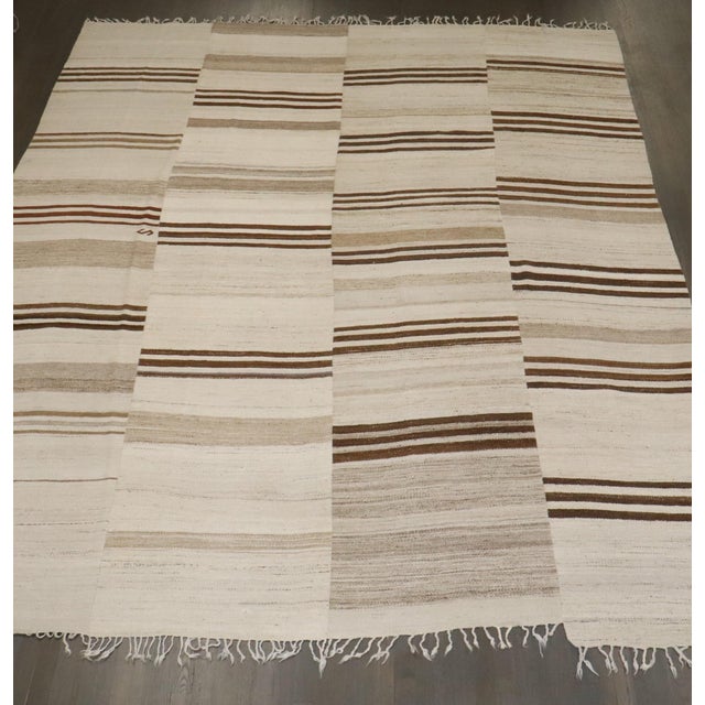 A room size mid 20th century white and brown Turkish Kilim Flat-weave