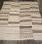 A room size mid 20th century white and brown Turkish Kilim Flat-weave