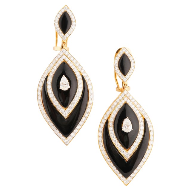 GW=21.793gm NW=17.343gm fancy diamond=0.79cts diamond=3.87cts black onyx =17.59cts THIS IS A BRAND NEW PIECE