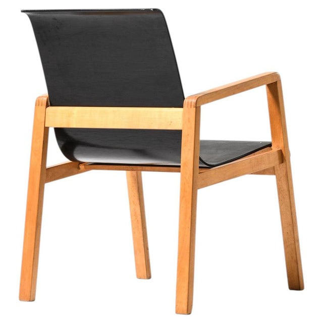 The armchair model 403, designed by alvar aalto and produced by artek in finland during the 1930s, is a significant...