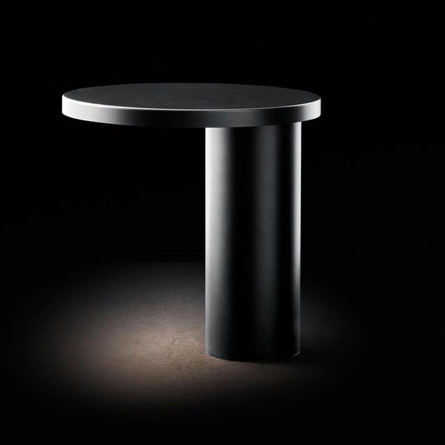 Table lamp "cylinda" designed by angeletti & ruzza in 2017. Table lamp giving direct led light in metal. Manufactured by...