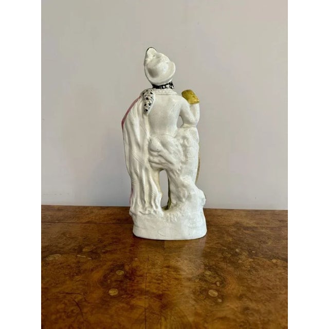 Large antique Victorian Robin Hood Staffordshire figure, having a quality large antique Staffordshire figure of Robin Hood...