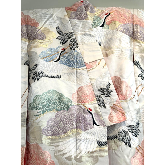 This is a hand-woven embroidered vintage Japanese silk wedding Kimono purchased in Tokyo in the 1980s, but seems to have...