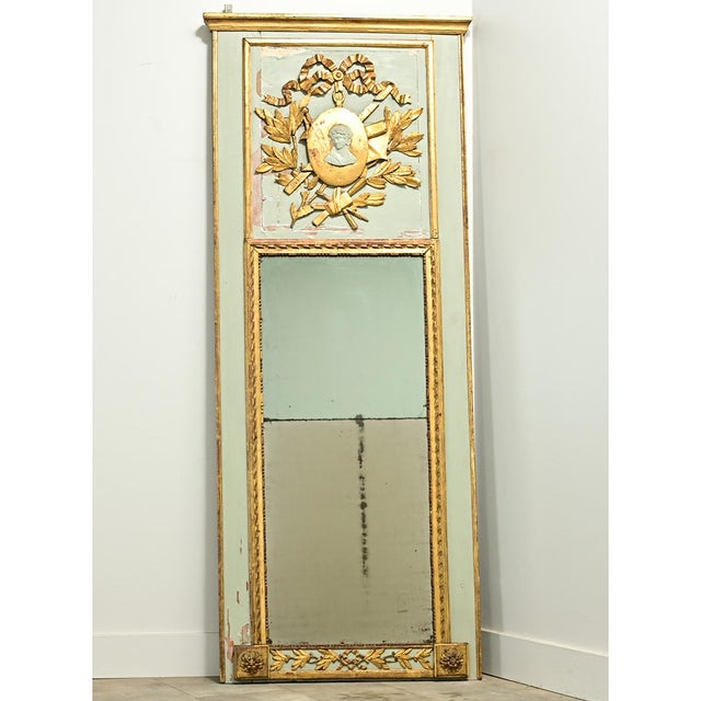 Dimensions: 85 ½” H x 32 ¾” W x 3” D An interesting Empire style French trumeau taken from a larger boiserie paneling. The...