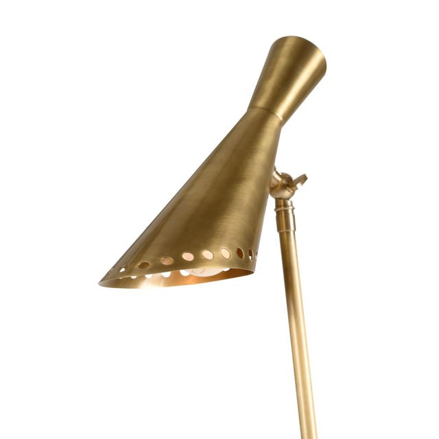 Provide mid-century modern style to your living space with our cliff may table lamp. This minimalist design is crafted of...
