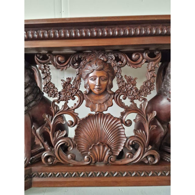 Neo-Renaissance style mahogany console.Exquisite carvings.Mahogany.France.1920s.Dimensions: height 75 cm; length 115 cm;...