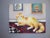 This oil on canvas features a striking orange cat lounging in a domestic setting, exuding a sense of curiosity and...