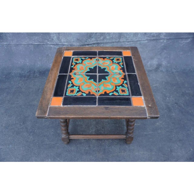 Measures 17 3/8" x 20 1/2" x 20 1/2". Gorgeous inlay of Taylor Tiles. These little tables were enormously popular in the...