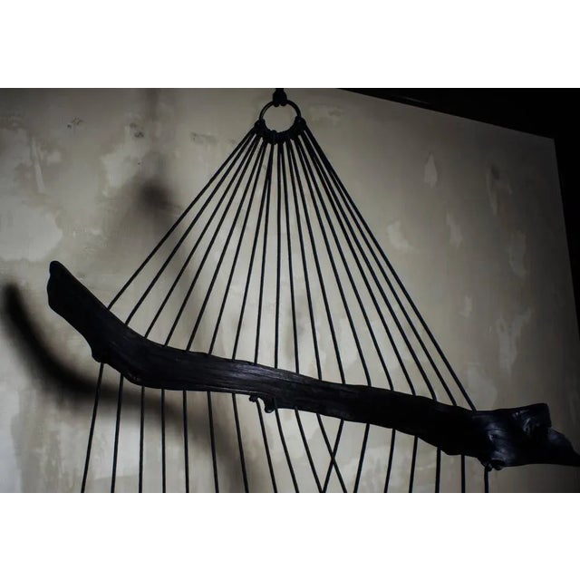 Burnt sculpted floating divan by Chiel Kuijl, WDSTCK Studio. Dimensions: height 110 cm, width 110 cm depth 55 cm. Material...