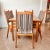 Set of six mid-century teak high back dining chairs by Nordic designed by Kai Kristiansen. Features solid teak framing...