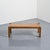 Modernist coffee table in solid wood, circa 1960, remarkable for the graphic construction of its tabletop. The tabletop is...