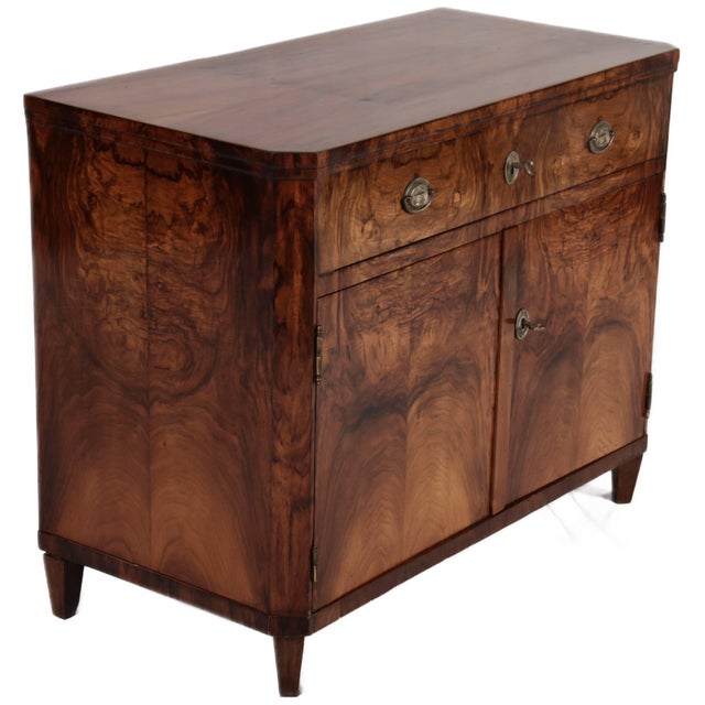 Age and Origin: The chest of drawers is likely from around 1820 and originates from Southern Germany. Material: The wood...