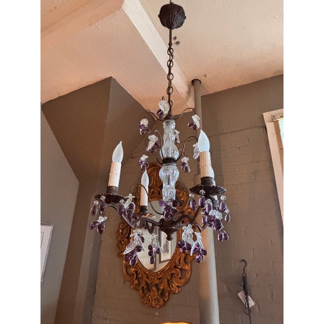 Antique patinated bronze, Louis XV -style four arm, chandelier with amethyst-color grape clusters and clear crystal...