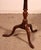 Elegant English mahogany side table, circa 1800. This small, unusual model, being smaller and lower than usual, is known...