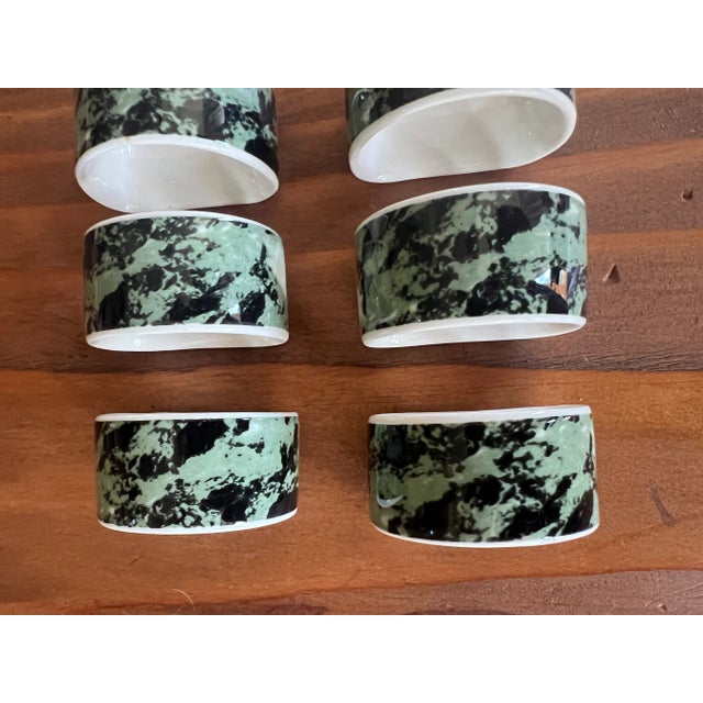 Elegant set of six porcelain napkin rings by Villeroy & Boch Luxembourg. Featuring a sophisticated green and black marbled...