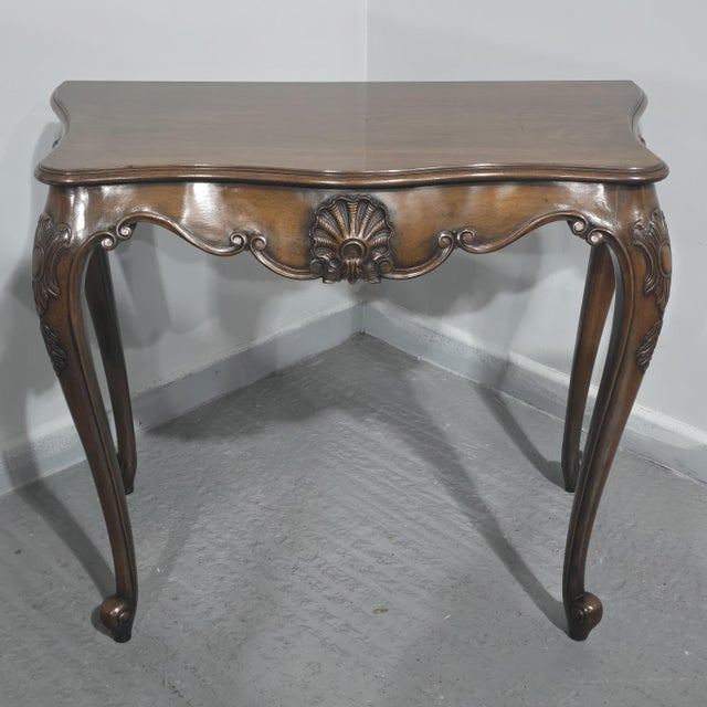 A very good Edwardian serpentine mahogany console hall table, with very crisp shell carving, in overall lovely original...