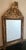 Antique French bridal mirror, hand carved wood top with a design of leaves, flowers and a heart in the center. The glass...