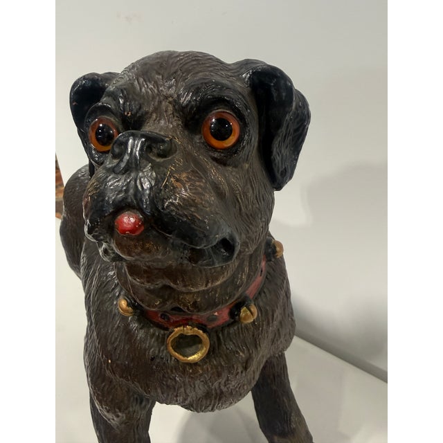 English Pug Dog Sculpture In Painted Terracotta, Early 20th Century This engaging figural sculpture depicts a stout, alert...