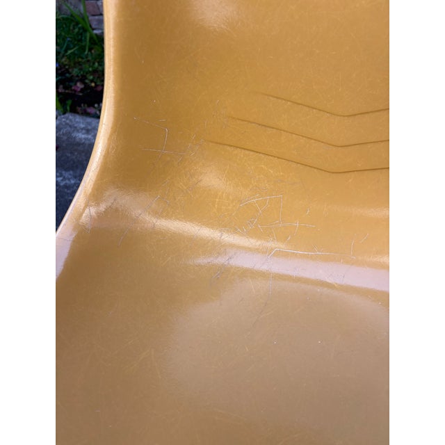 Striking pair of vintage mid-century modern fiberglass stacking chairs by Howell of St. Charles, Illinois. Dating to...