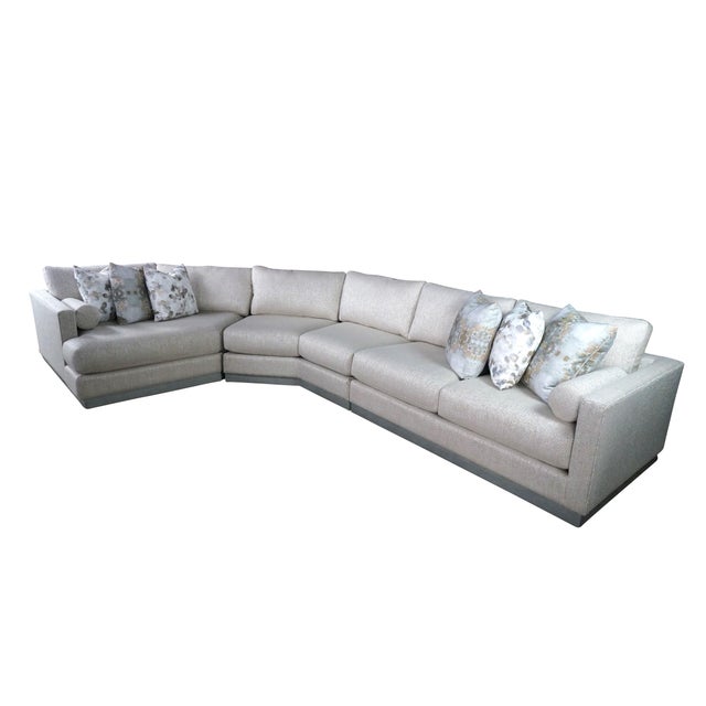 The Langdon Plus Sectional II by Lazar Industries blends timeless, clean-lined contemporary style with deep, luxurious...