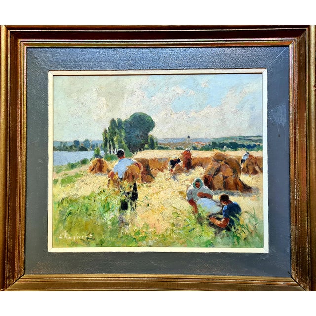 French Impressionist oil on canvas, mid 20th Century, of a harvest scene by Alfred Jean Chagniot. The painting is signed...