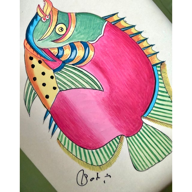 A joyful hand-painted fish full of color and charm. Hand-painted by master artists using acrylic paints and natural...