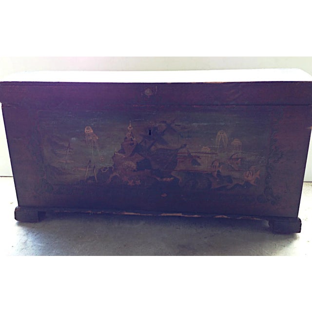 Antique dome top trunk circa 1860 with hand painted sea life scenes.