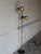This adjustable metal floor lamp delivers sleek task lighting with two directional cylinder shades. Built with a slender...