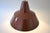 Enamelled work lamp by Louis Poulsen from the 1960s, chocolate brown exterior, white enamelled metal interior. Textile...