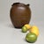Old Japanese earthenware jar with a strong, well-balanced form and a warm, deep brown glaze. Dimensions: height 30 cm,...
