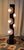 A monumental 1970s California Organic Modern statement piece: the carved sculptural "Totem" cylinder floor lamp by...