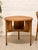 A beautifully crafted vintage round side table by Brown Saltman, showcasing the sophisticated woodworking and clean...