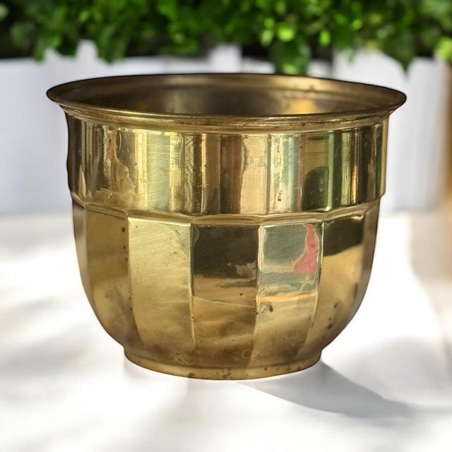 Marked Made in England 6” tall x 8” round x 6” deep Condition notes: aged patina to brass-wear condo with age and use. Has...