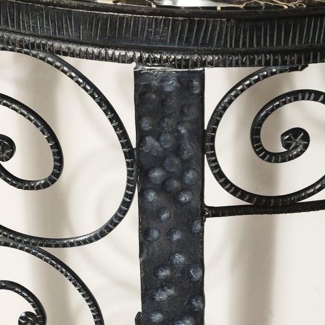This elegant Art Deco demilune console table exemplifies the sophistication and craftsmanship synonymous with French...