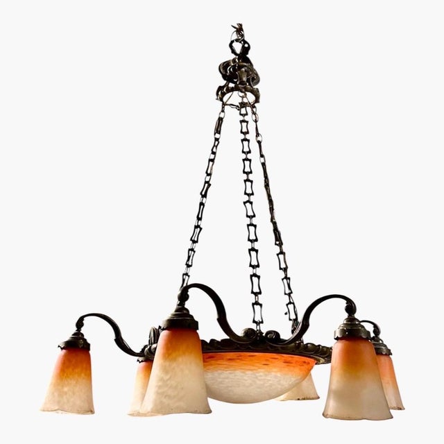 Buying a signed 7‑light Schneider chandelier can make sense both aesthetically and as a collectible object, Artistic and...