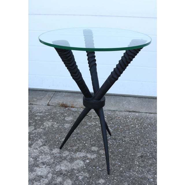 Bring a striking, sculptural element to your interior with this exceptional pair of Oryx Gazella Horn Tripod Side Tables....