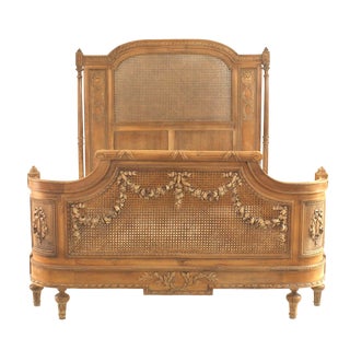 French Louis XVI Style Carved Walnut and Cane Bed For Sale
